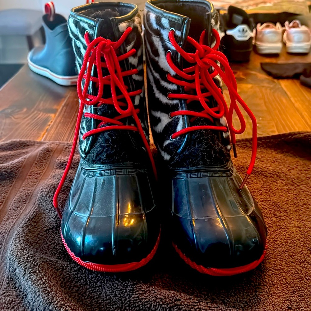 Black and red Rain boots.